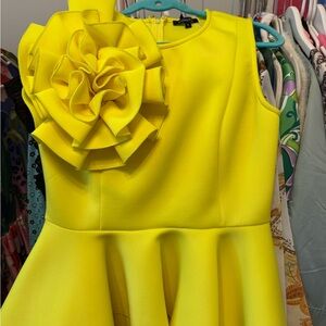 Yellow Sleeveless Top with Floral Accent